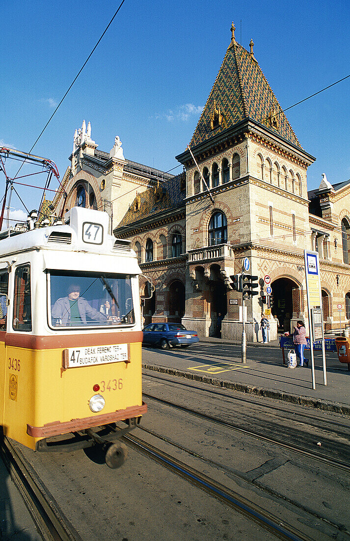 Hungary, Budapest, Pest, Old market and tramway.