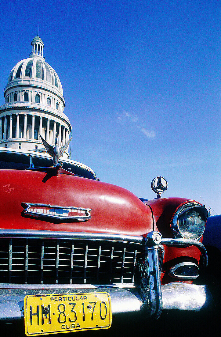 Cuba, Havana, Capitol. Old American car.