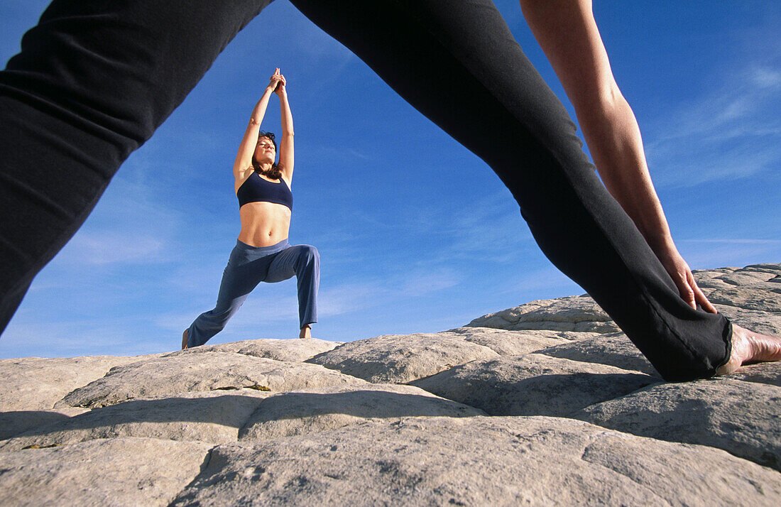 Practicing yoga at Snow Canyon State Park. Utah, USA