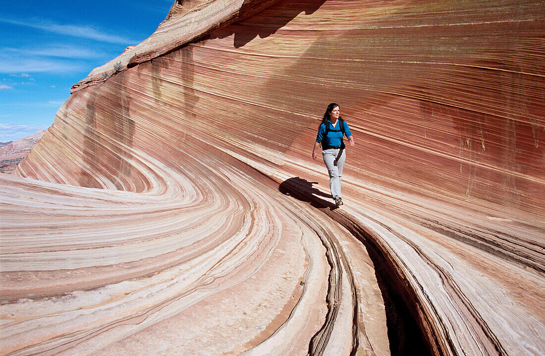 Hiking. The Waves , Coyote Buttes, Paria wilderness. Arizona. USA.