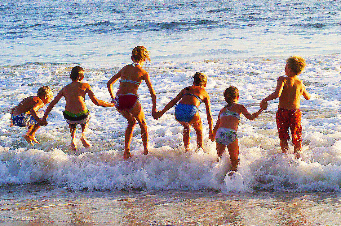 friends playing at the beach