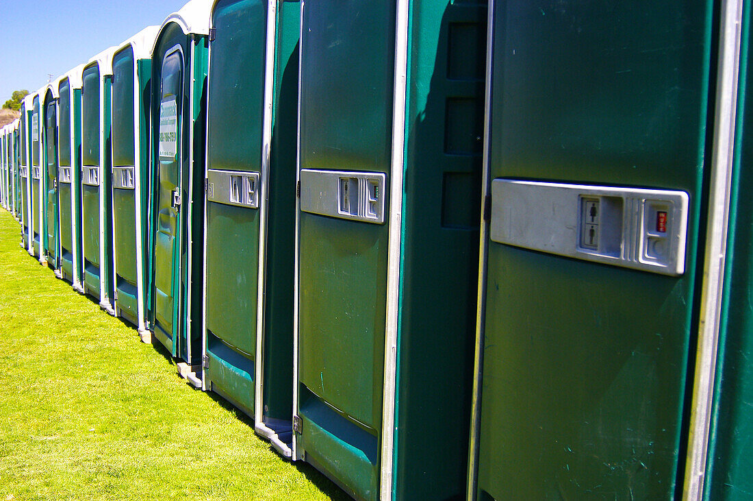 line of portable toilets