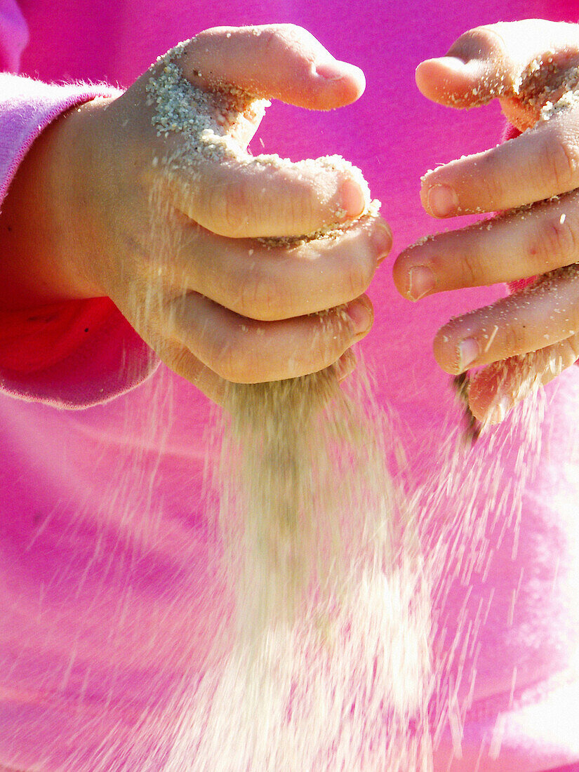 sand slipping through fingers