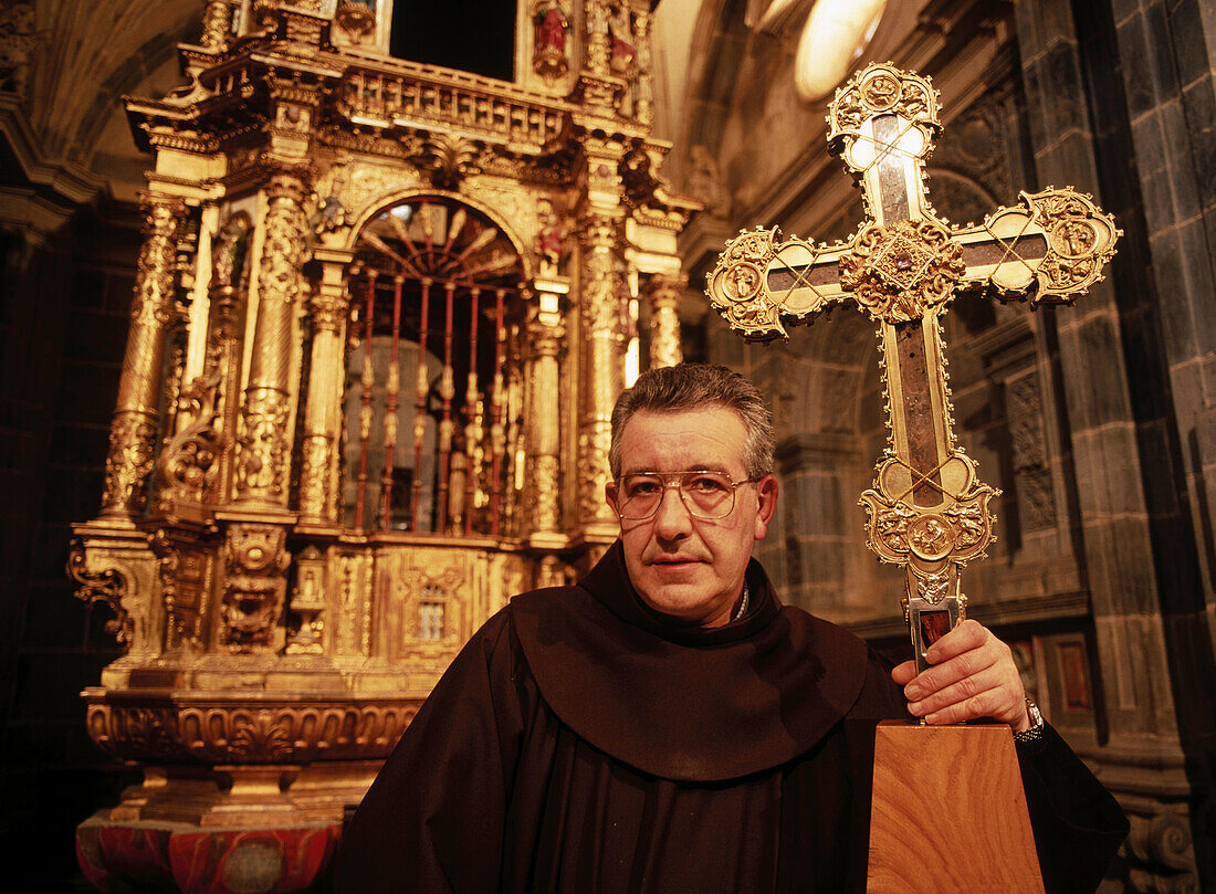 Monk and the Lignum Crucis, the greater known piece of the true cross of Christ. Santo Toribio de Liébana monastery. Cantabria, Spain