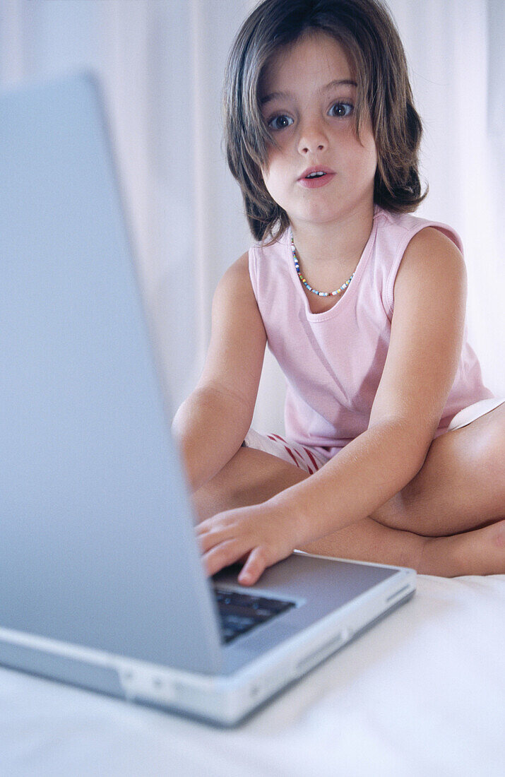 aucasians, Child, Childhood, Children, Color, Colour, Computer, Computers, Contemporary, Crossing legs, Dark-haired, Education, Facial expression, Facial expressions, Female, Girl, Girls, Grin, Grinni
