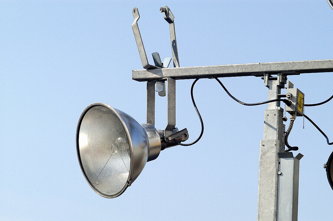  Color, Colour, Concept, Concepts, Daytime, Electricity, Exterior, Floodlight, Floodlights, Horizontal, Illumination, Industrial, Industry, Light, Lighting, One, Outdoor, Outdoors, Outside, F58-249256, agefotostock 