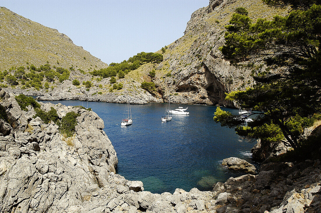 View of sa Calobra from a hole in the tunnel going to Pareis Torrent, Escorca. Majorca. Balearic Islands. Spain