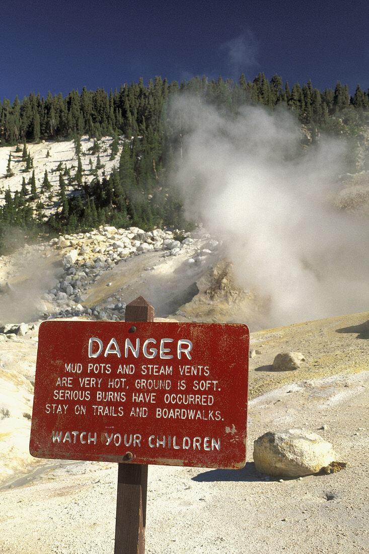 Danger warning sign next to hydrothermal hot spirng at Bumpass Hell, Lassen Volcaninc National Park, California