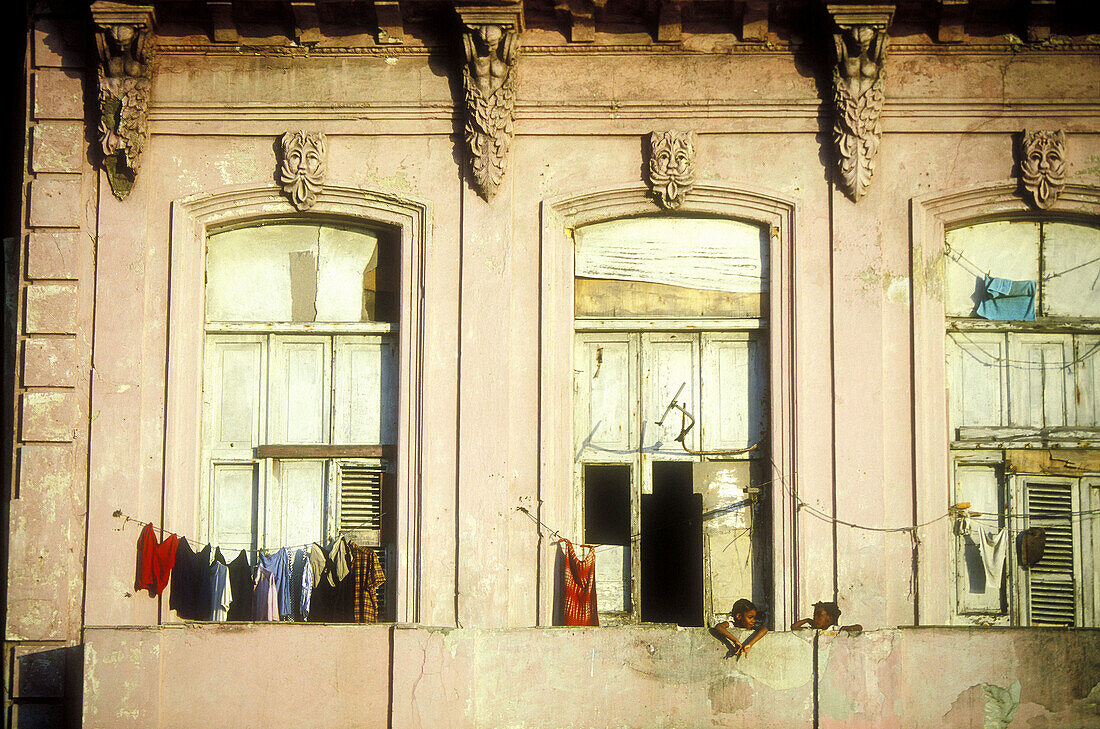 Washing hung out on balcony of old building. Havana. Cuba