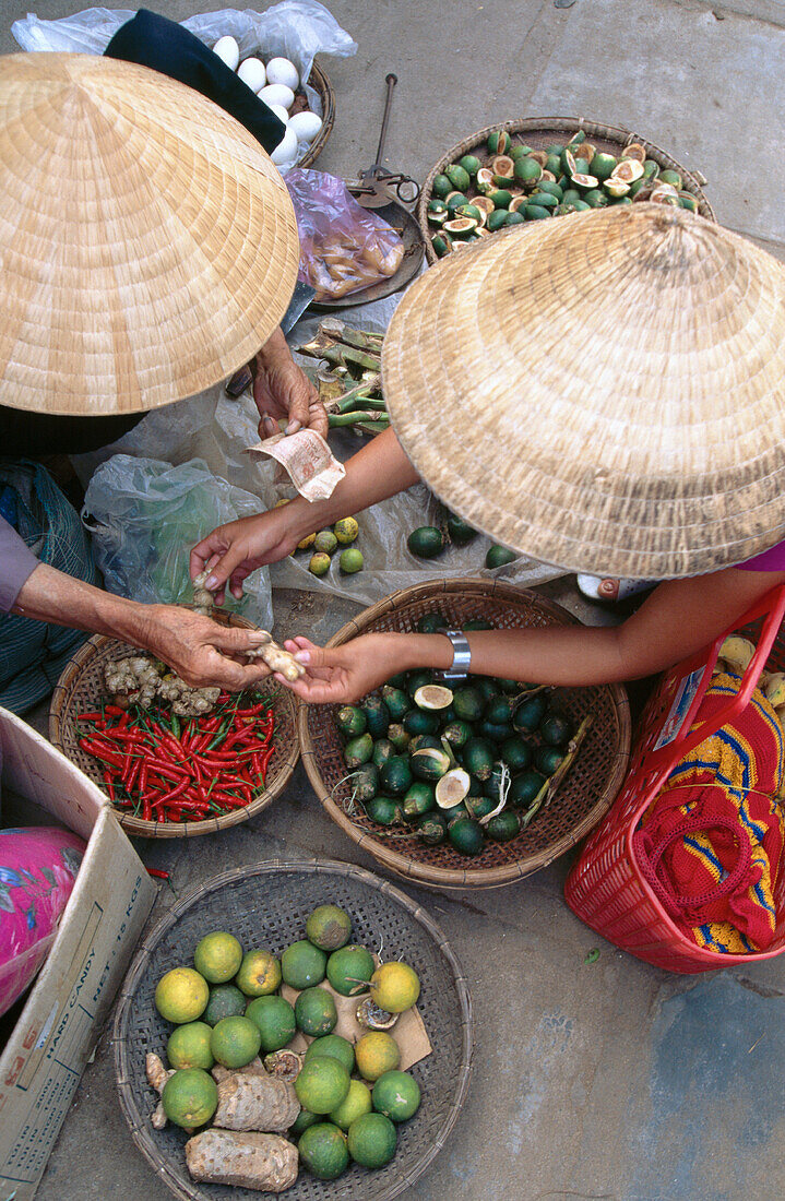 Women trading at market. Vietnam