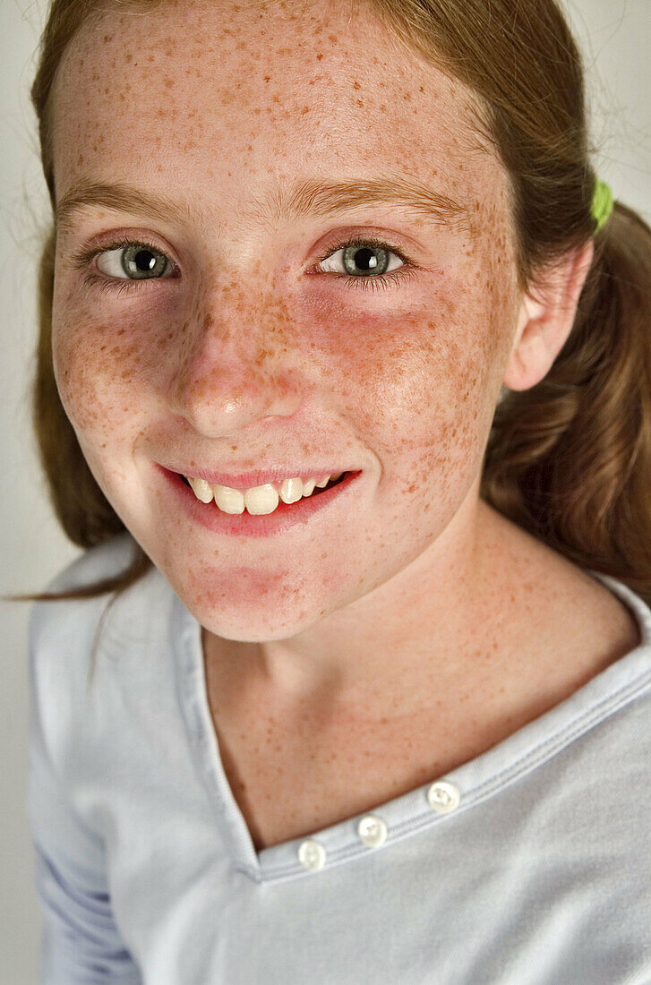 Young girl with freckles