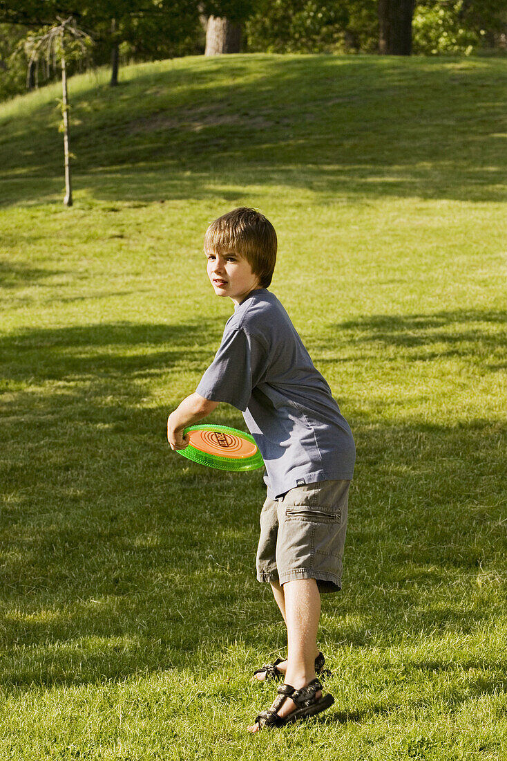 dhood, Children, Color, Colour, Contemporary, Country, Countryside, Daytime, Disk, Disks, Exterior, Frisbee, Frisbees, Full-body, Full-length, Game, Games, Gesture, Gestures, Gesturing, Grass, Human