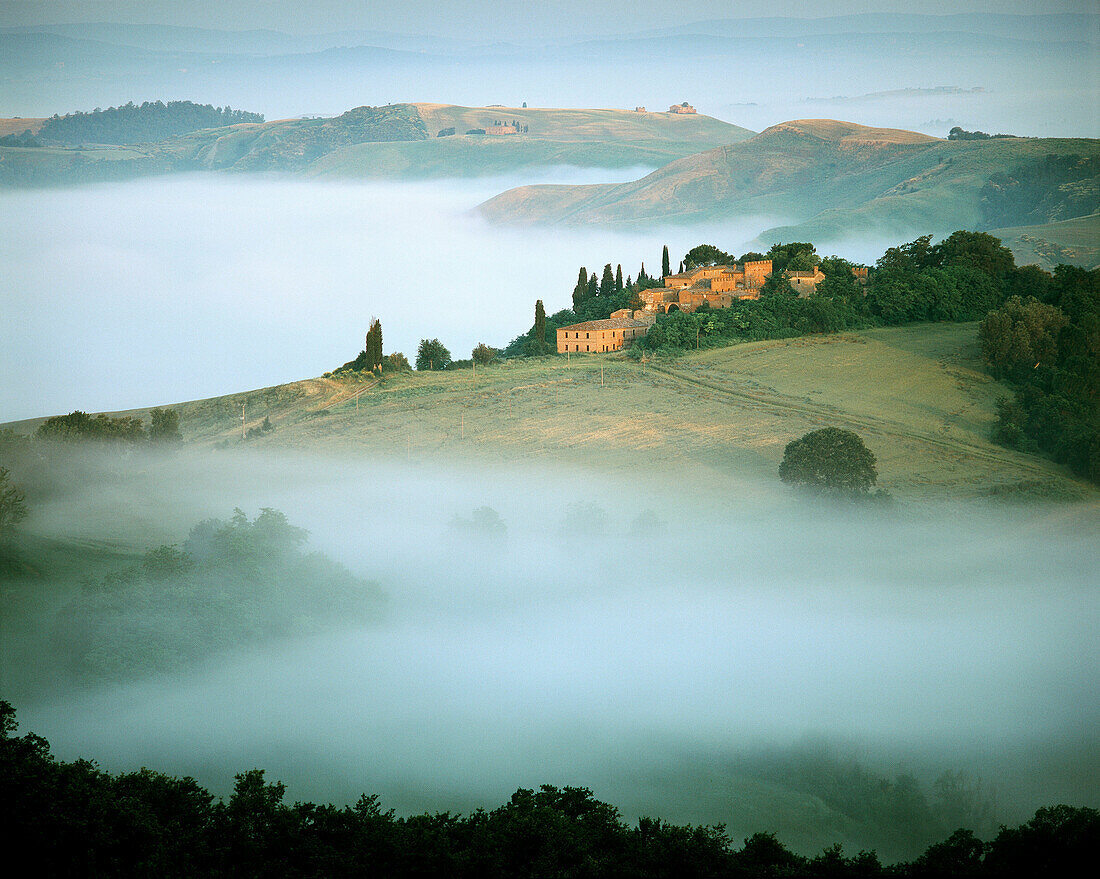 Val d Orcia, Tuscan landscape at sunrise. Italy