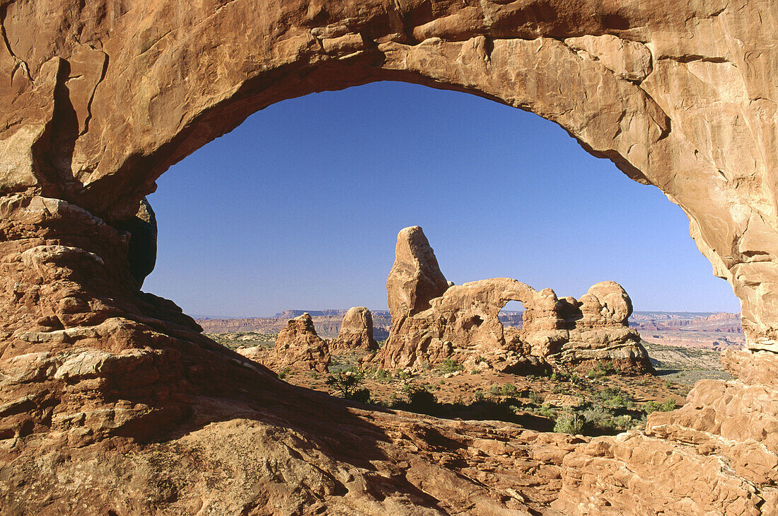 Turret Arch viewed trough North Window. Arches National Park. Utah. USA