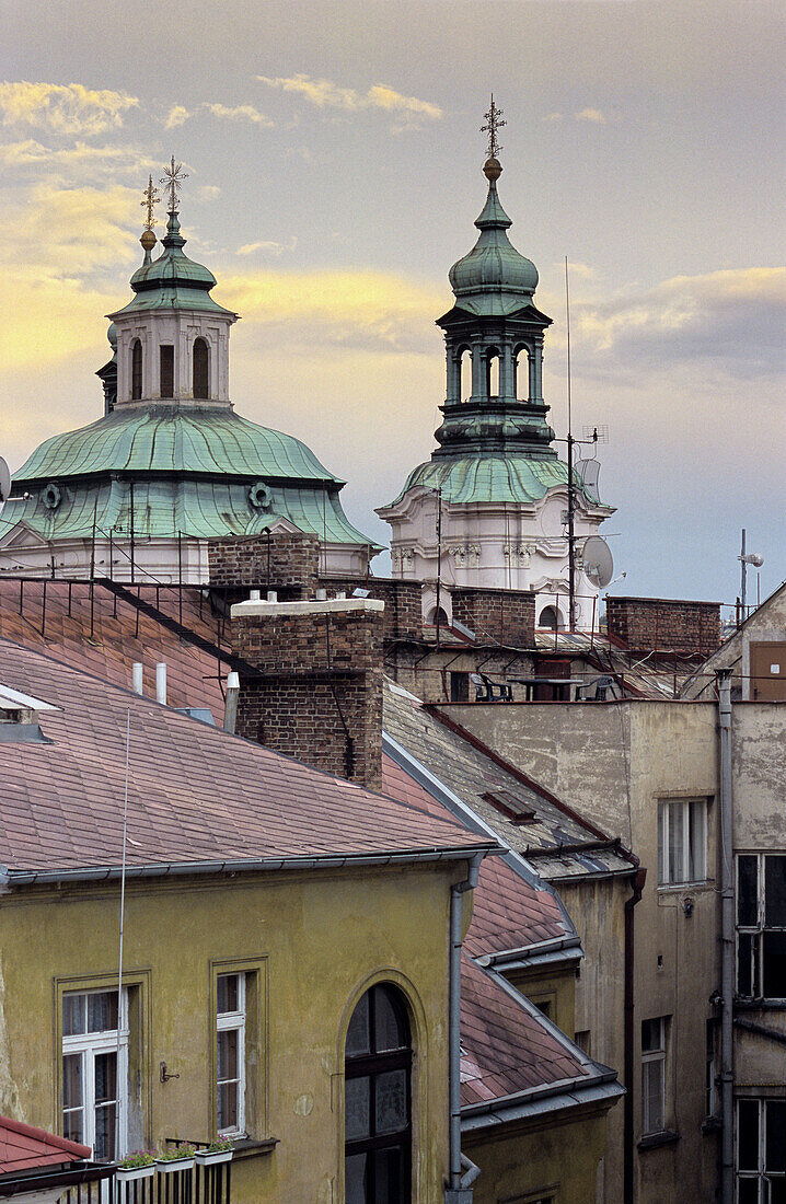 Old Town rooftops, towers of St. Nicholas Church. Prague. Bohemia. Czech Republic