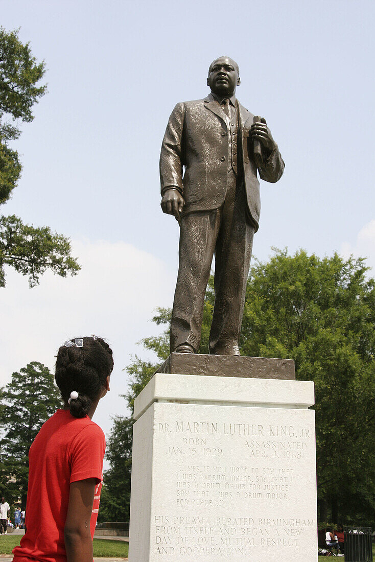 Juneteenth Celebration, Kelly Ingram Park, Martin Luther King statue, Black female student. Birmingham, Alabama. USA.