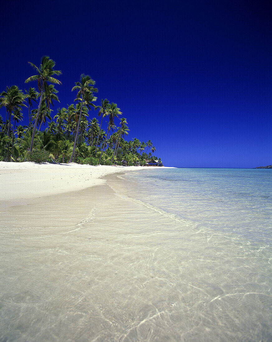 Scenic beach, Plantation resort, Molololailai island coastline, Fiji.