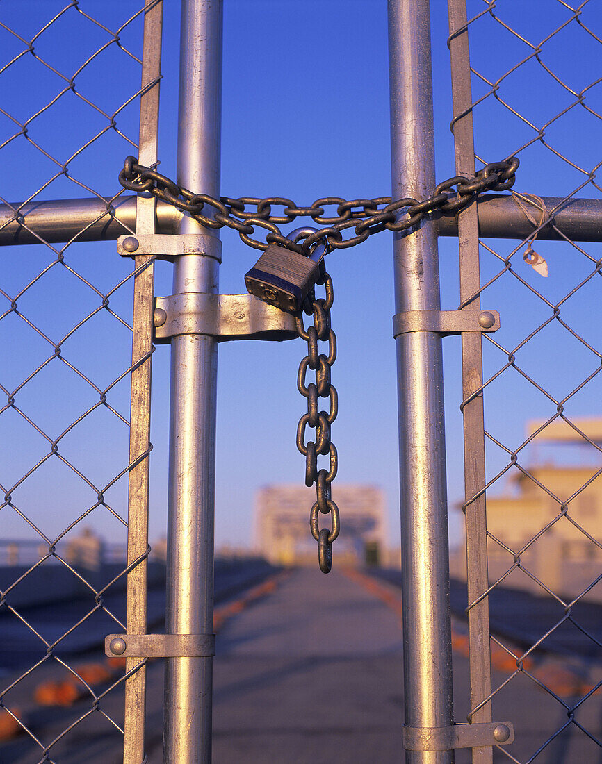 Padlocked security gate.