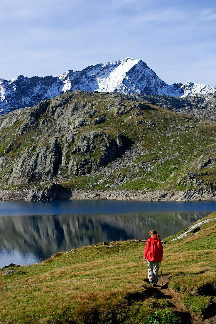 Woman hiking at Lago del Naret, Canton of Ticino, Switzerland