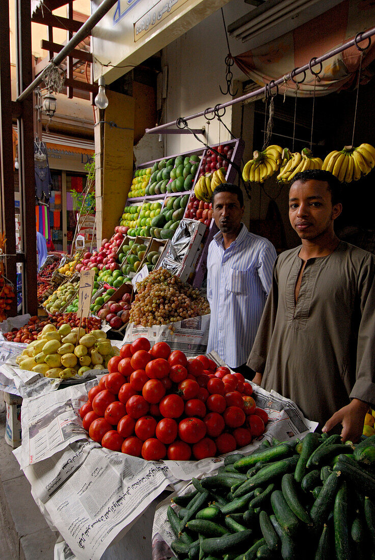 dealer of vegetables at local market, Luxor, Egypt, Africa