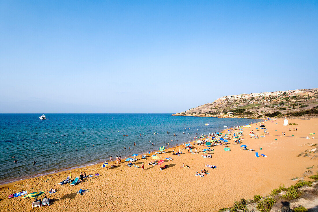 People at the beach under blue sky, Ramla Bay, Gozo, Malta, Europe