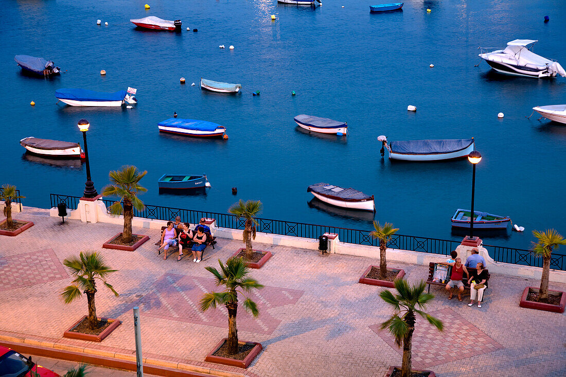 People at the promenade in the evening, Marsamxett Harbour, Sliema Creek, Sliema, Malta, Europe