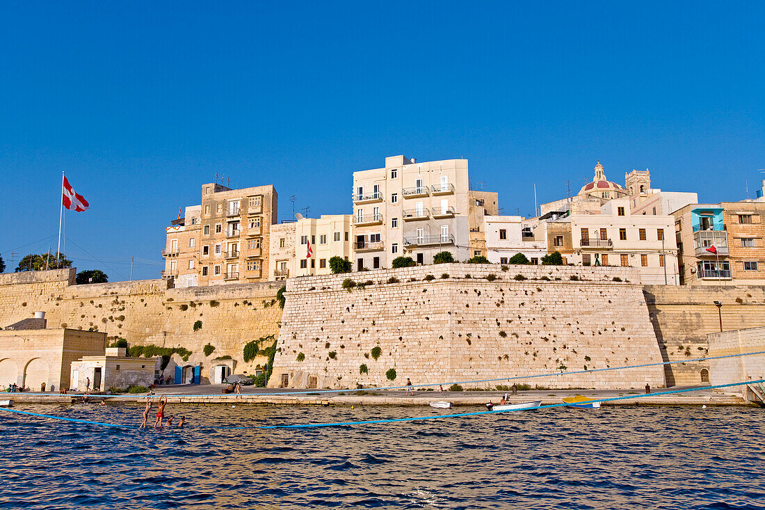View at the old citiy wall under blue sky, Three Cities, Vittoriosa, Valletta, Malta, Europe