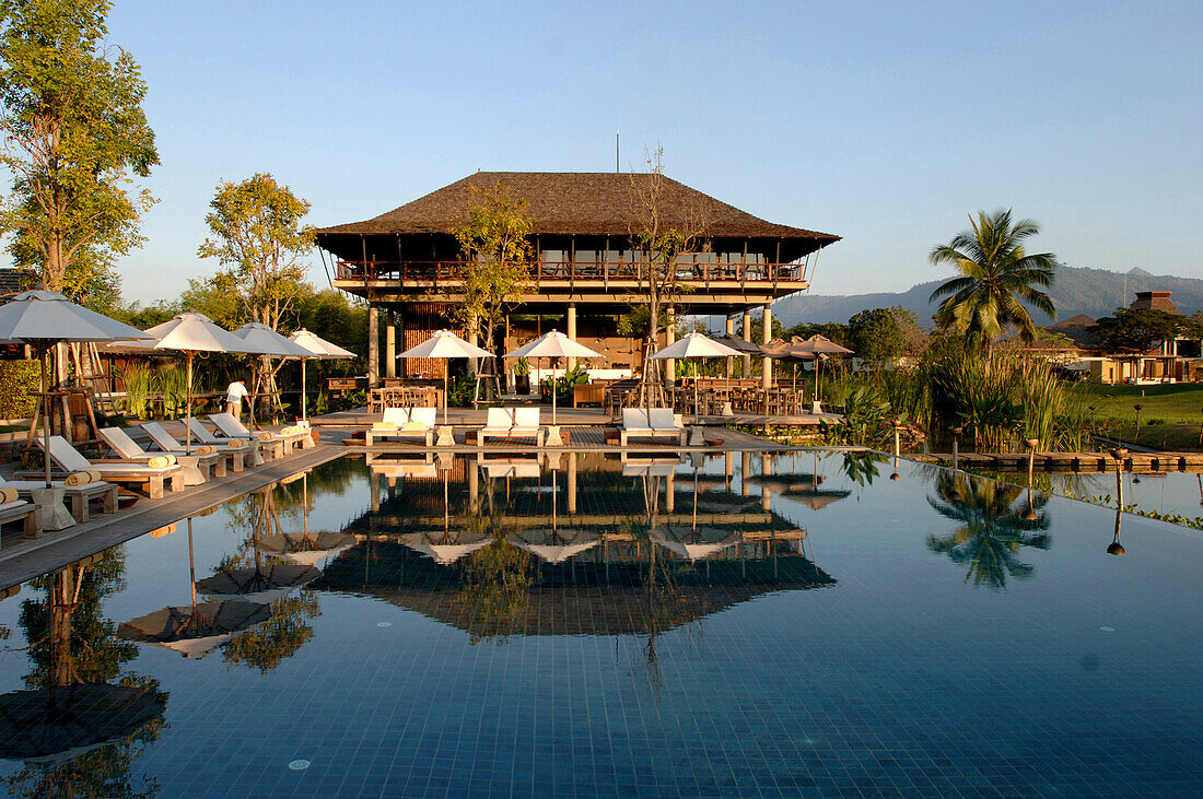 Swimming pool and sunloungers at Kirimaya Design Hotel, Thailand