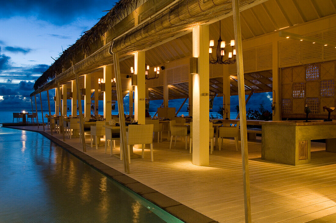 Blu restaurant in the evening light, Four Seasons Resort Landaa Giraavaru, Maldives