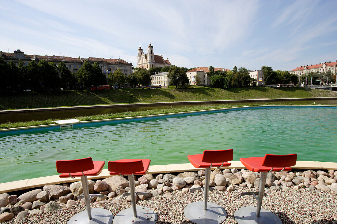 Pool bar on the river Neris, Jakobus monastery in the background, Vilnius, Lithuania
