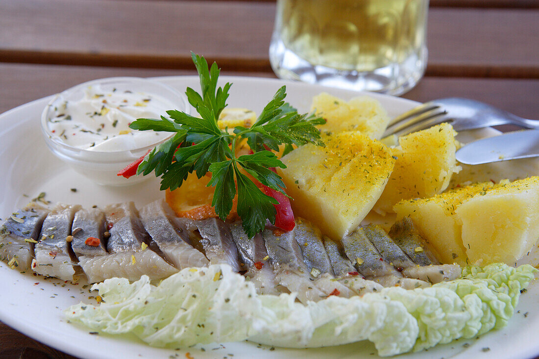 Matjes, pickled herring is a typical lithuanian meal, Lithuania