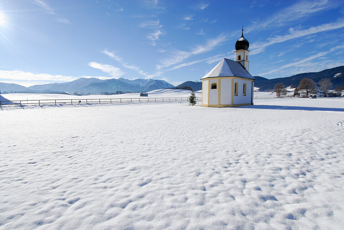 Chapel in winter near Hundham, Fischbachau, Upper Bavaria, Germany