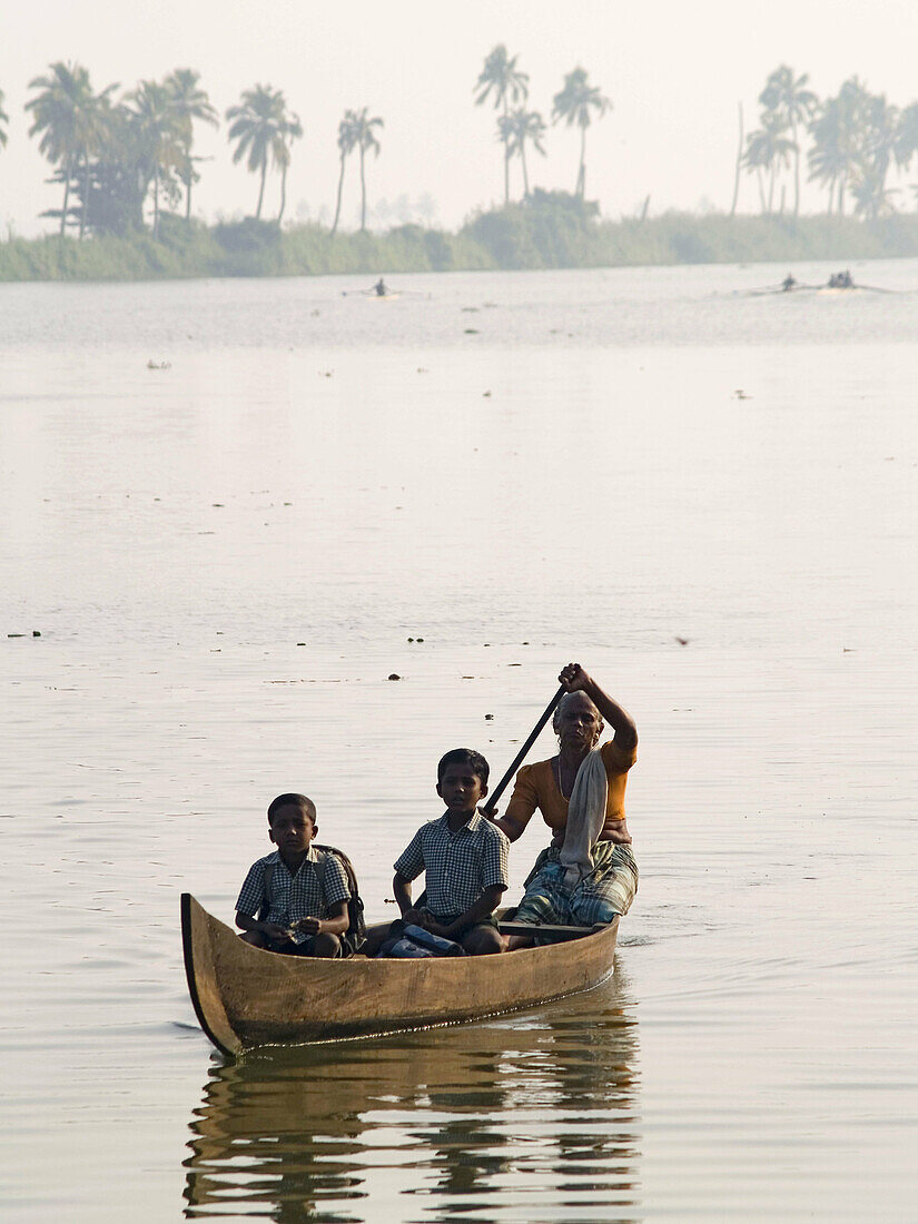 Boat travelling on Vembanad Lake near Alappuzha (Allepey). India