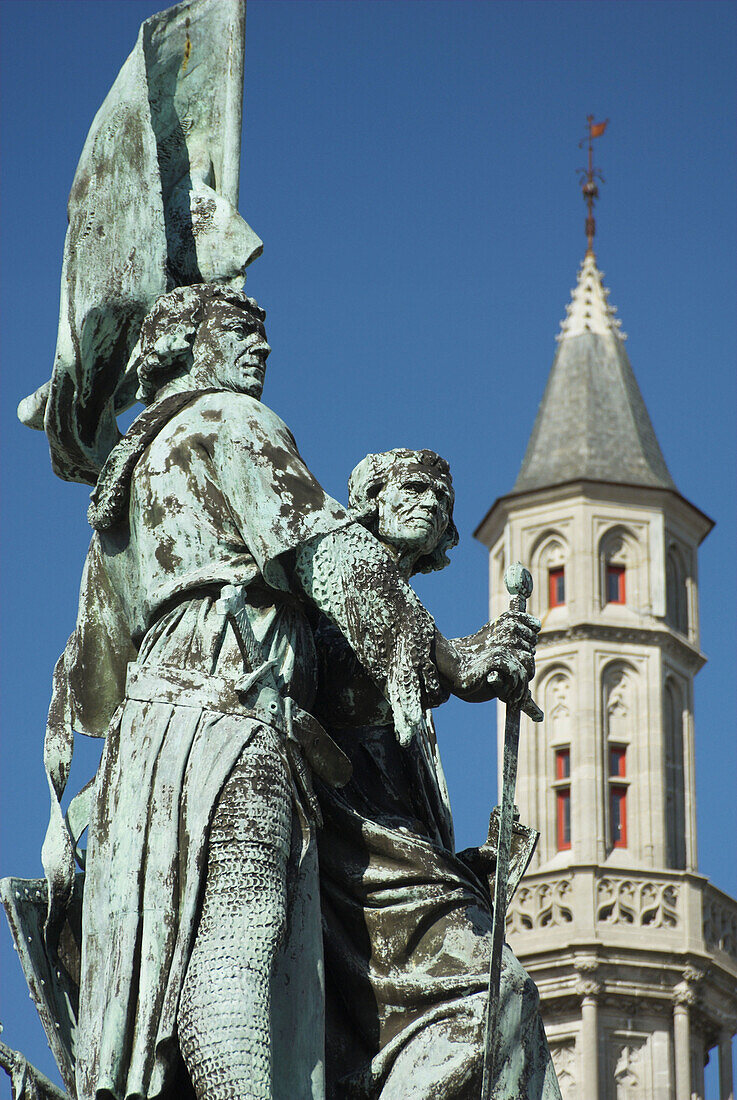 Europe. Belgium. West-Vlaanderen (Flanders). . Brugge (Bruges). The Markt (Main Market Place). Statue of Pieter de Coninck and Jan Breidel.