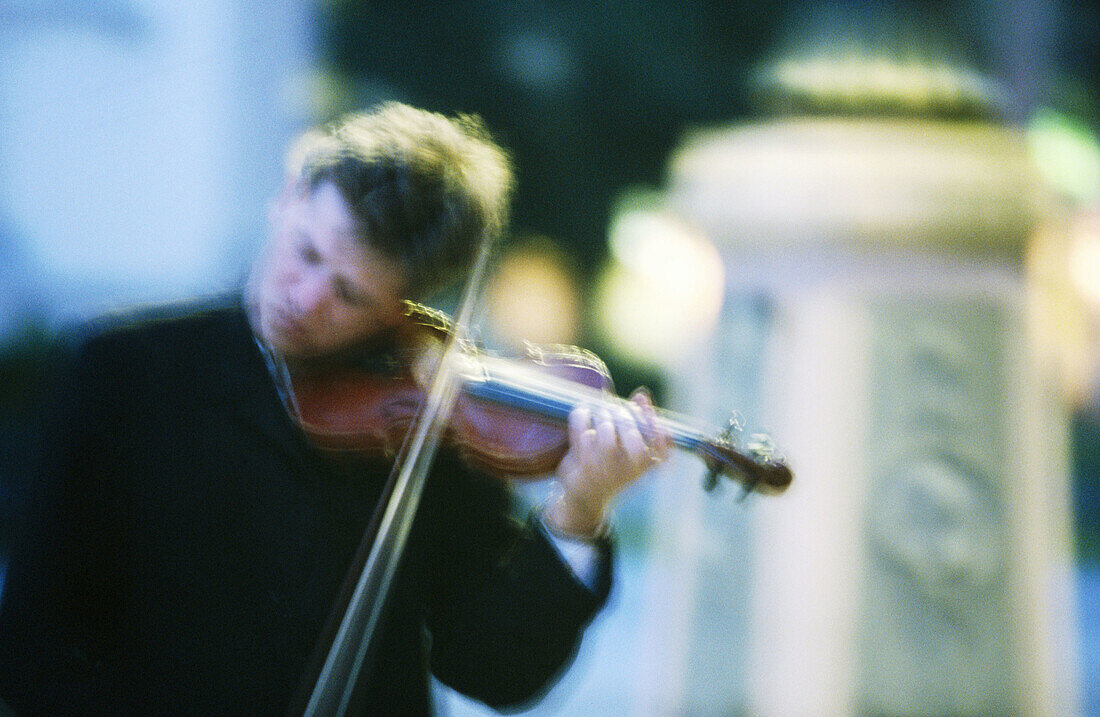 Violinist in Gendarmenmarkt. Berlin. Germany.