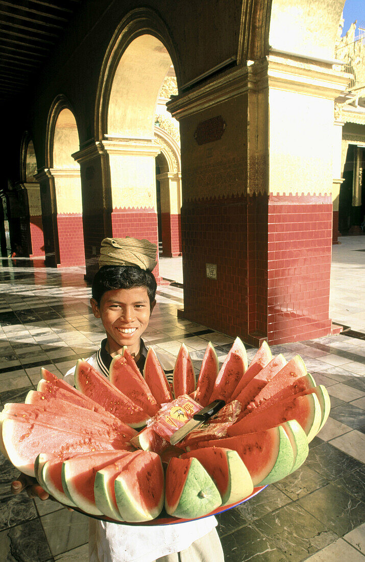 Young man portrait. Maha Muni Pagoda. Mandalay. Myanmar (Burma).