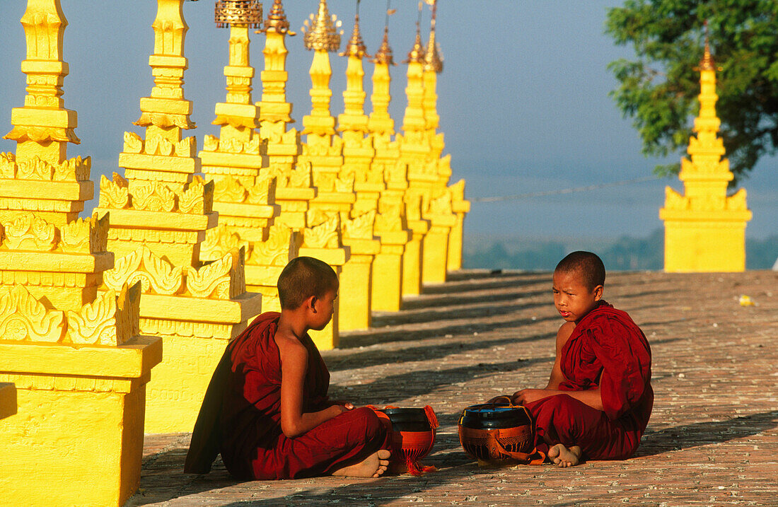 Novice monks at U-Min Thonze Pagoda. Sagaing. Mandalay. Myanmar (Burma).
