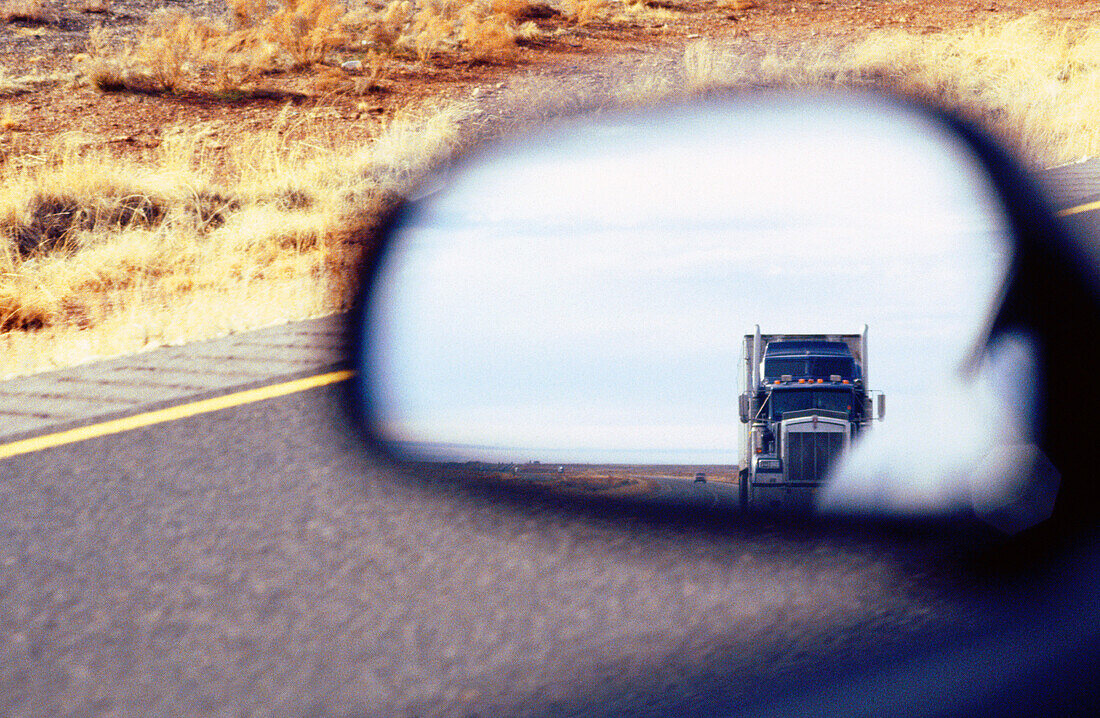 Truck in rearview mirror