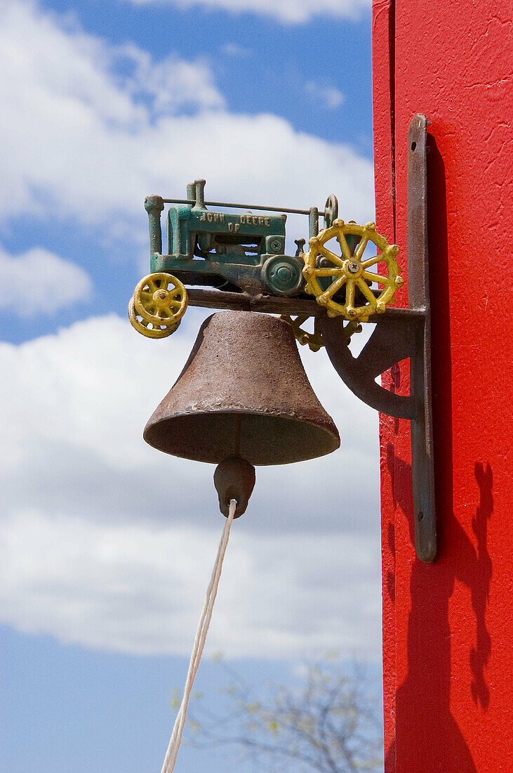 Tractor bell on a red barn at the Faulkner Farm, Santa Paula, California