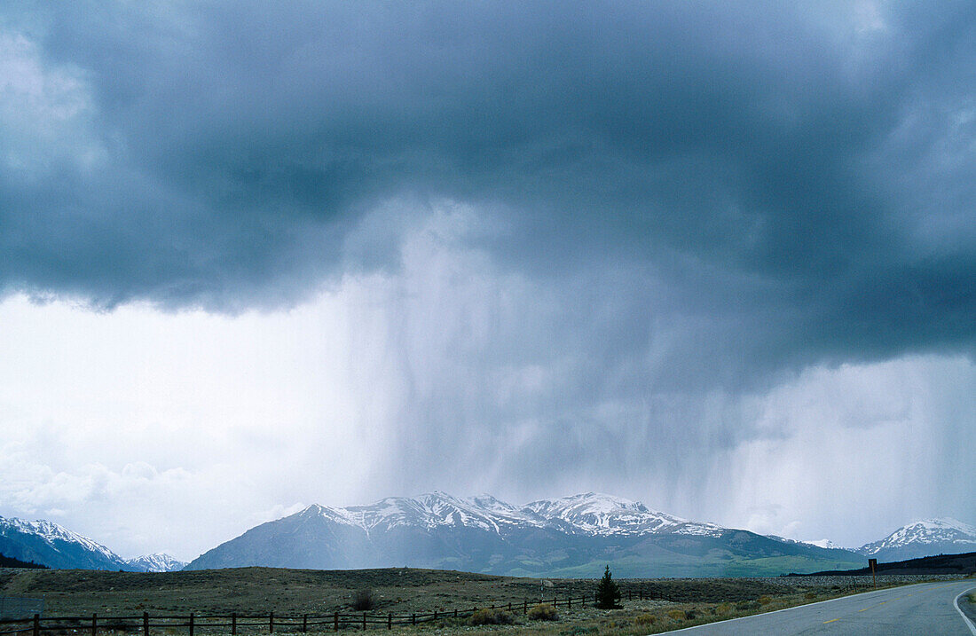 Rainstorm with heavy clouds, in southwest Colorado, USA. Photo taken in early April 2001