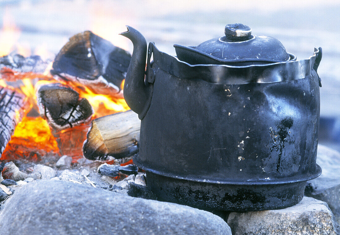 Old coffee pot by the fire. Lapland, Sweden, Scandinavia, Europe.