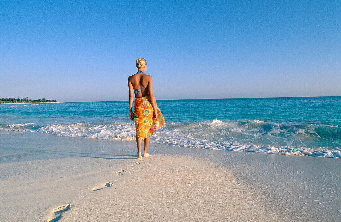 Woman on the beach of Playa Sirena, Cayo Largo, Cuba