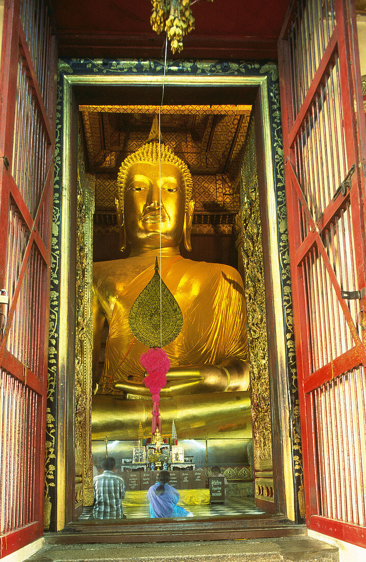 Giant Buddha statue in a temple of Ayutthaya. Thailand