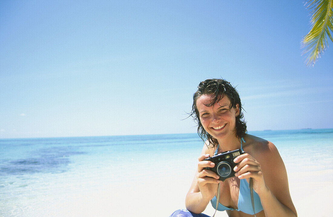 Woman on a beach. White Sands Resort and Spa. Ari Atoll. Maldives