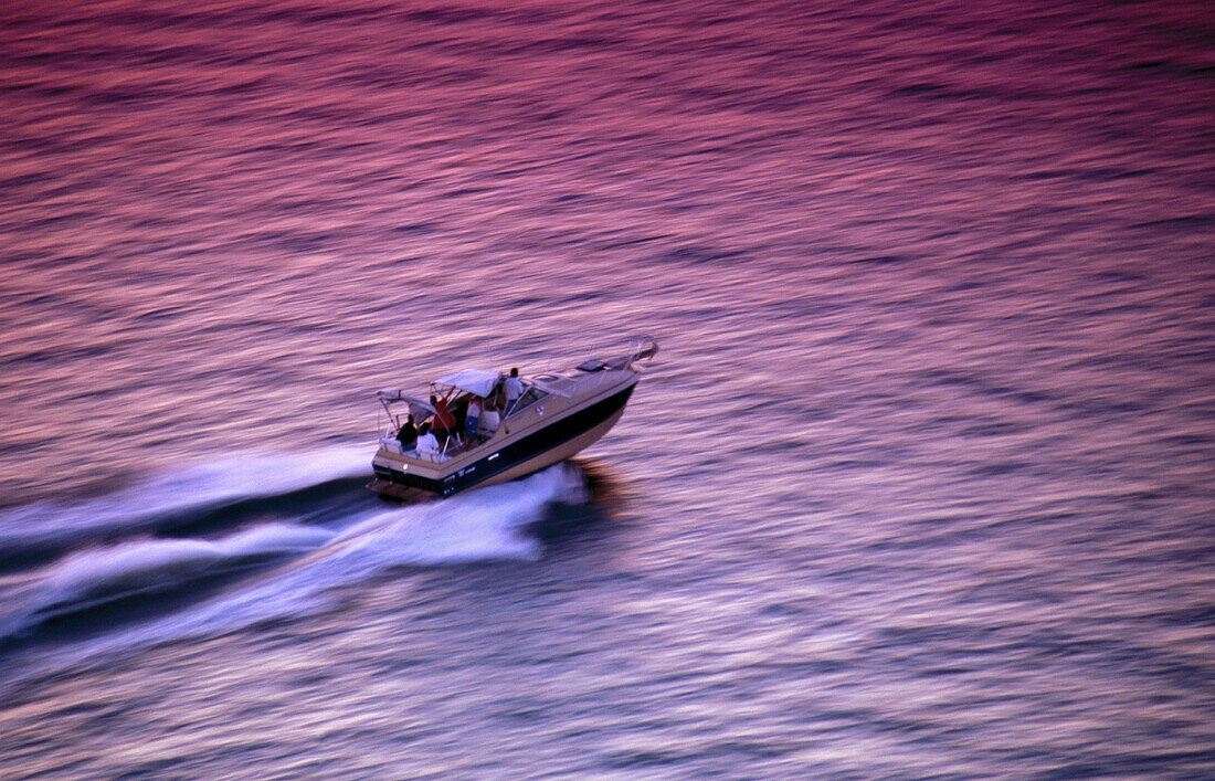 Speedboat on violet water. Lake Erie. Pennsylvania. USA