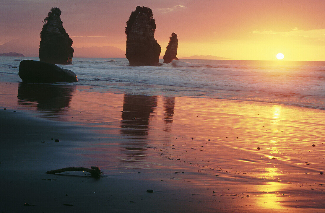 The Three Sisters at sunset, Tongaporutu, North Taranaki. South Island. New Zealand