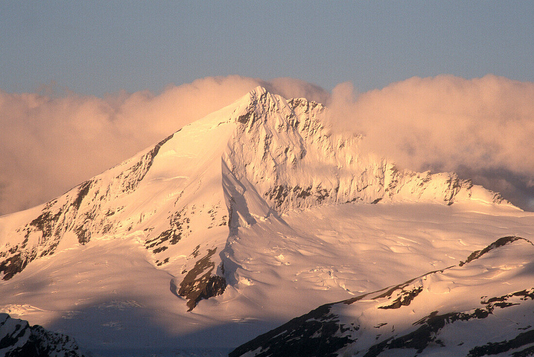 Mount Aspiring at sunset. South-west ridge from Cascade Saddle. Mount Aspiring National Park. New Zealand