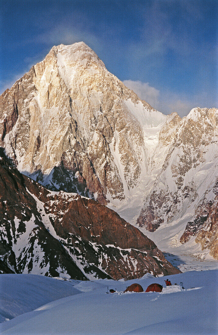 Camp under Gasherbrum IV west face, 7925 m. at sunset, Concordia. Karakoram mountains, Pakistan