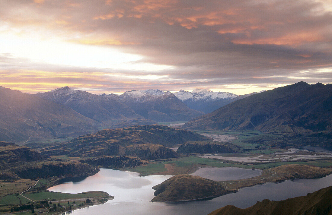 Sunset over Lake Wanaka. Mt. Aspiring in distance from Mt. Roy. Central Otago. New Zealand.