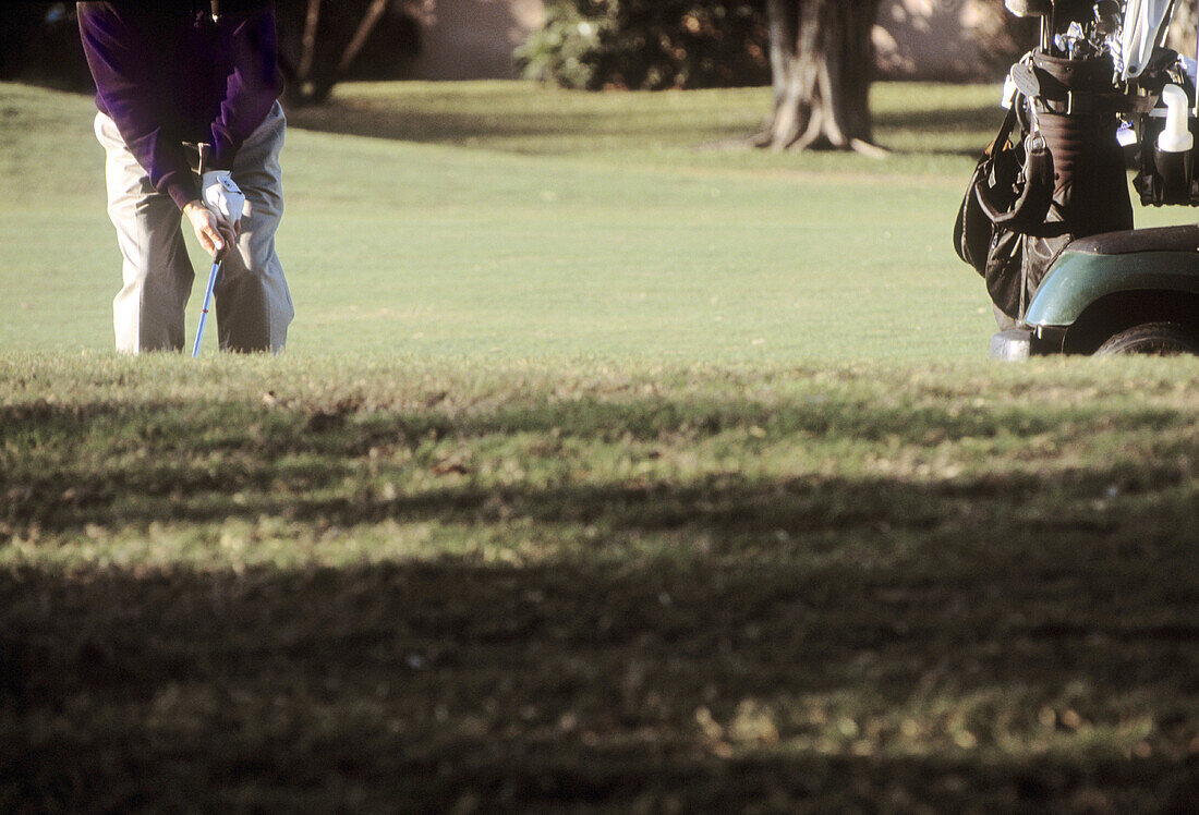 Man playing golf